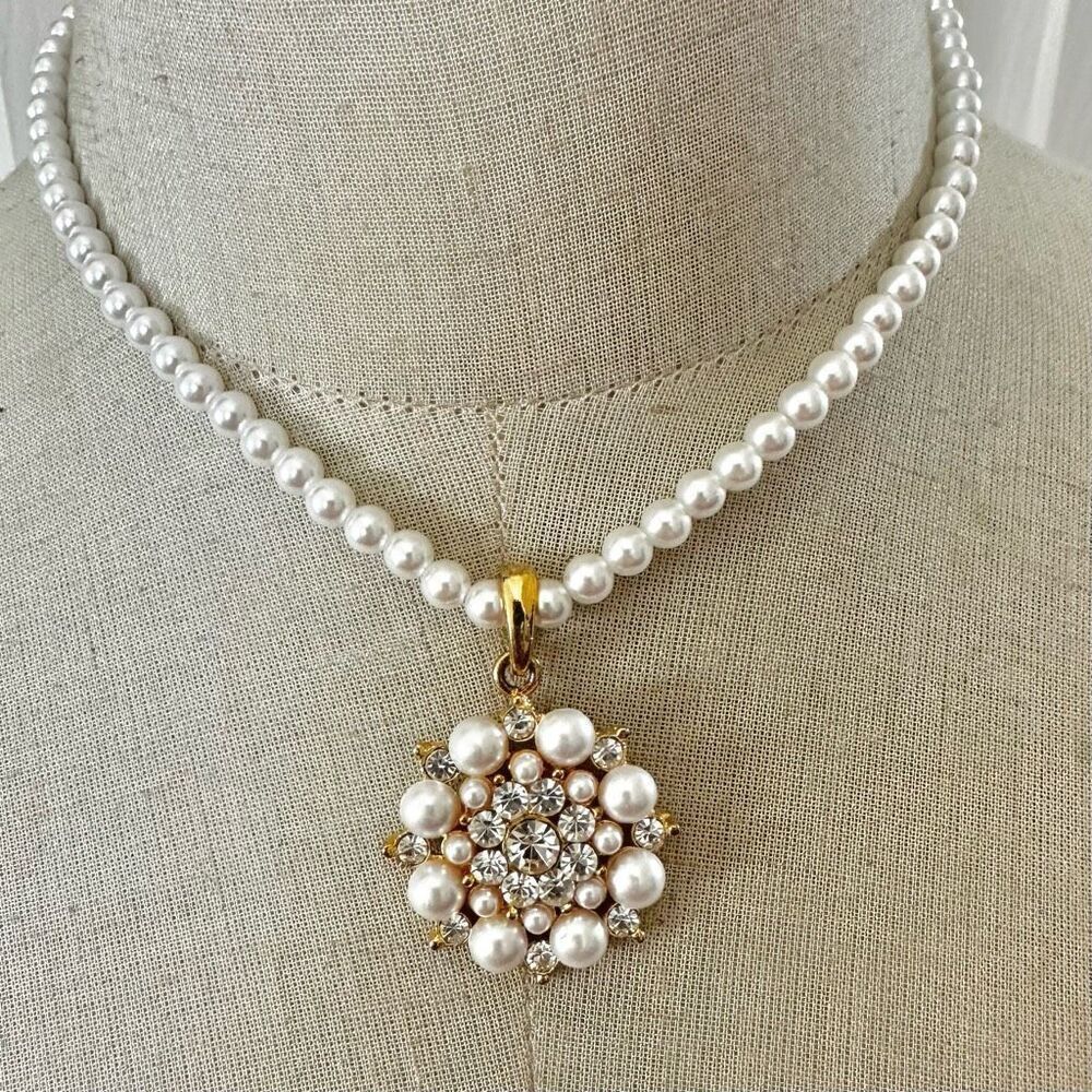 Faux pearl gold tone rhinestone pendant necklace